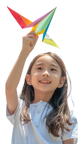asian girl holding a paper plane