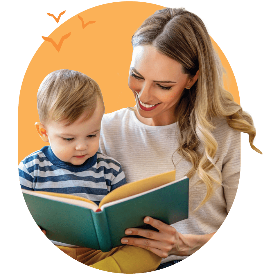 therapist reading a book to toddler boy